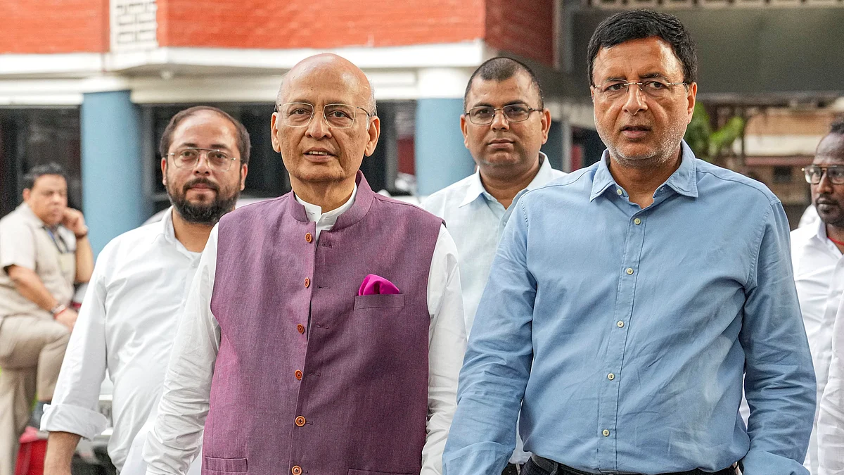 Cong leaders Randeep Singh Surjewala (right), Abhishek Manu Singhvi and others leave ECI (photo: PTI)