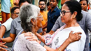 Mamata Banerjee on the campaign trail in Malda district (photo: PTI)