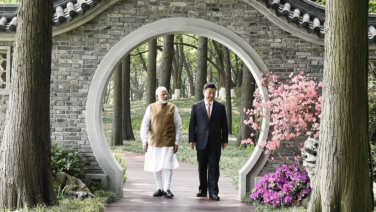 PM Narendra Modi with Chinese President Xi Jinping in Wuhan in 2018 (photo: @PMOIndia/X)