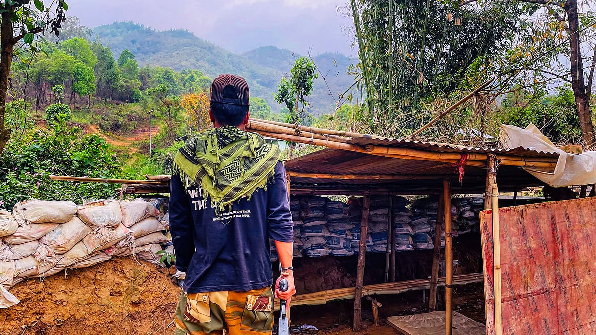A 'village volunteer' stands guard at a bunker in conflict-hit Manipur (photo: PTI)