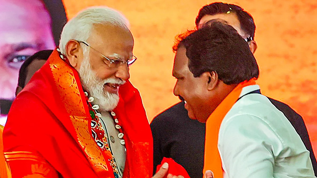 PM Modi being welcomed to an election meeting in Warangal, Telangana (photo: PTI)