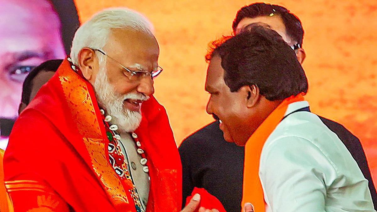 PM Modi being welcomed to an election meeting in Warangal, Telangana (photo: PTI)