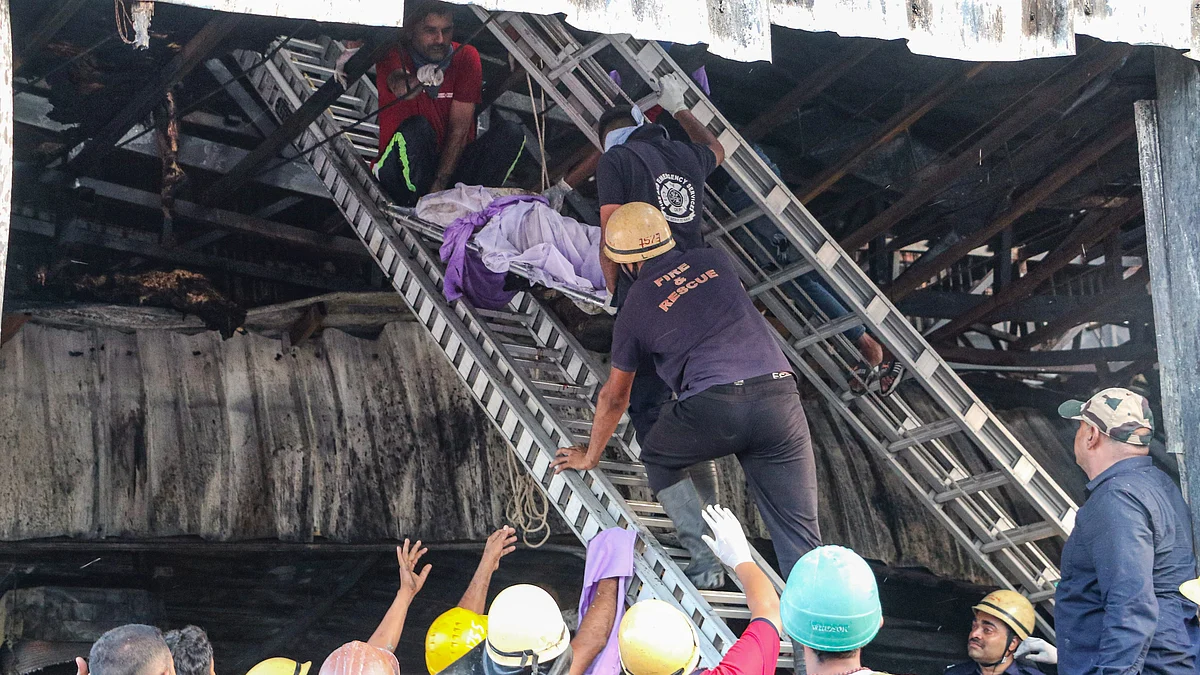 Rescue work underway after a fire broke out at gaming zone in Rajkot on 25 May (photo: PTI)