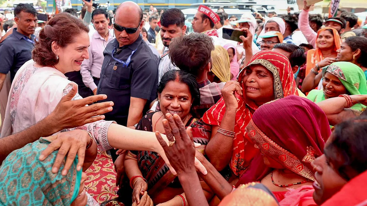Congress leader Priyanka Gandhi Vadra interacts with supporters during an election rally in Amethi on 10 May (photo: PTI)