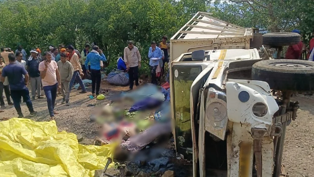 The overturned and tumbled goods vehicle that killed 12 women and one man in Kabirdham valley (photo: IANS)