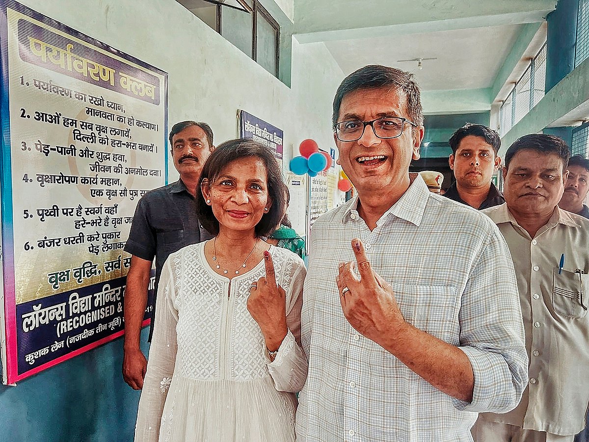 Chief Justice of India D.Y. Chandrachud shows his inked finger