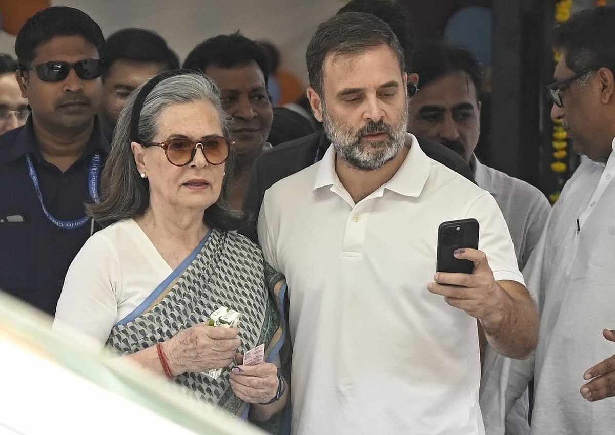 Sonia Gandhi (left) and Rahul Gandhi seen leaving the polling booth after voting (photo: Vipin/National Herald)