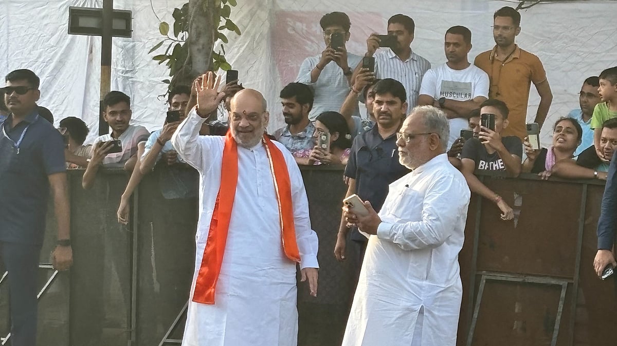 Home minister Amit Shah beats Prime Minister Narendra Modi to the polling booth in Gandhinagar, Gujarat (photo courtesy @AmanKayamHai_/X)