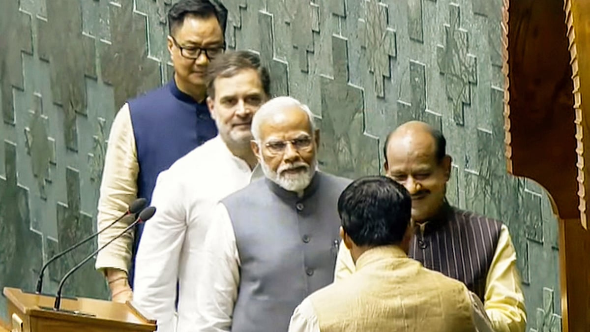 PM Modi, Rahul Gandhi and Kiren Rijiju escort Om Birla to the chair after his election (photo: PTI)