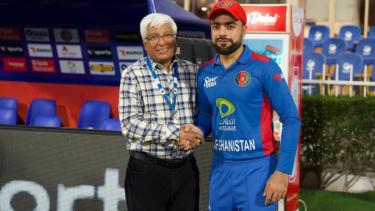 Afghanistan captain Rashid Khan with Mazhar Khan 