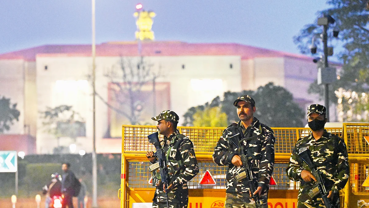 Security personnel stand guard outside Parliament House in New Delhi (photo: HT)