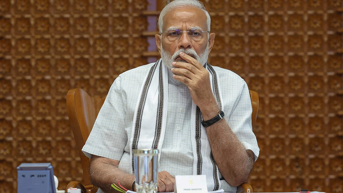Narendra Modi chairs a meeting in New Delhi on 2 June (photo: PTI)