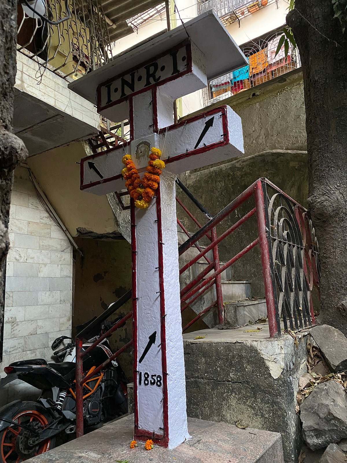 An old cross in a veranda of a home occupied by Hindus, Marol