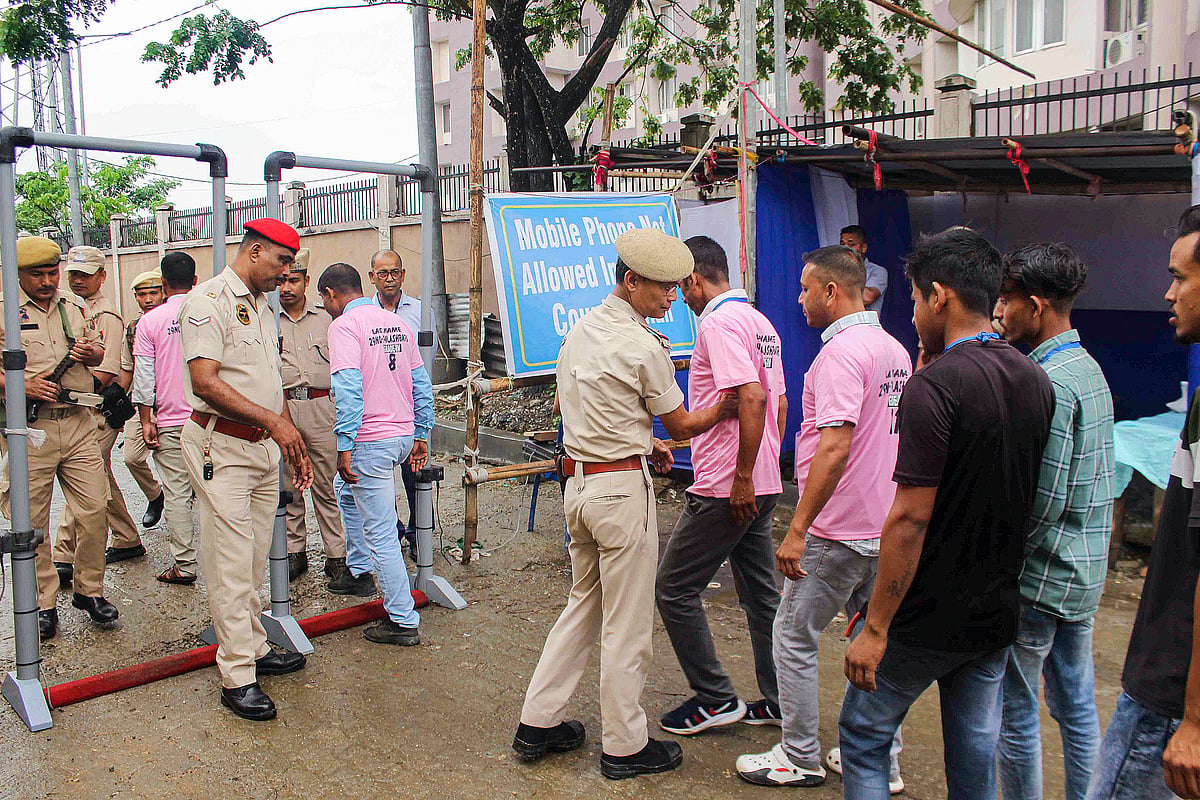 Polling officials checking into a counting centre in Assam (photo: PTI)