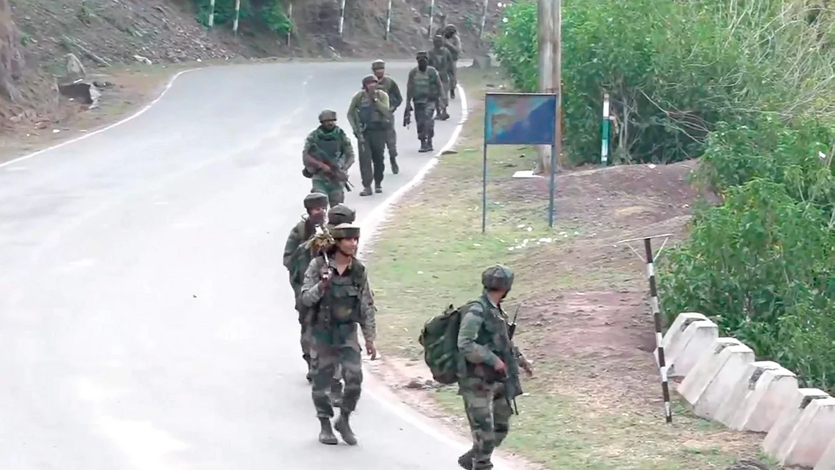 Security personnel during a search operation in Reasi on 10 June (photo: PTI)