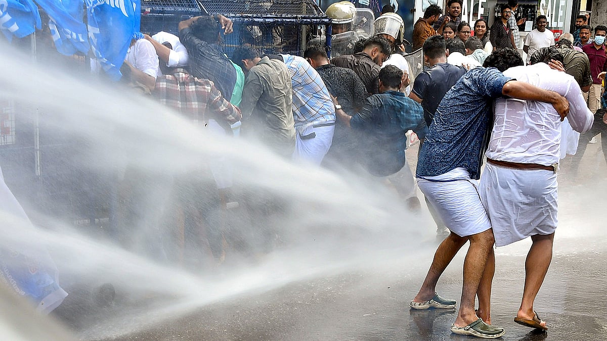 Police use water cannons to disperse KSU activists in Thiruvananthapuram on 15 June (photo: PTI)