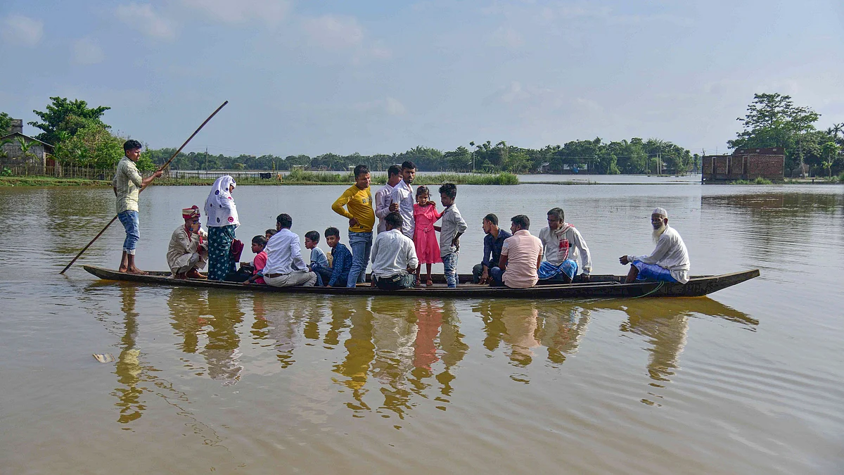 A flooded village in Nagaon district on 20 June (photo: PTI)