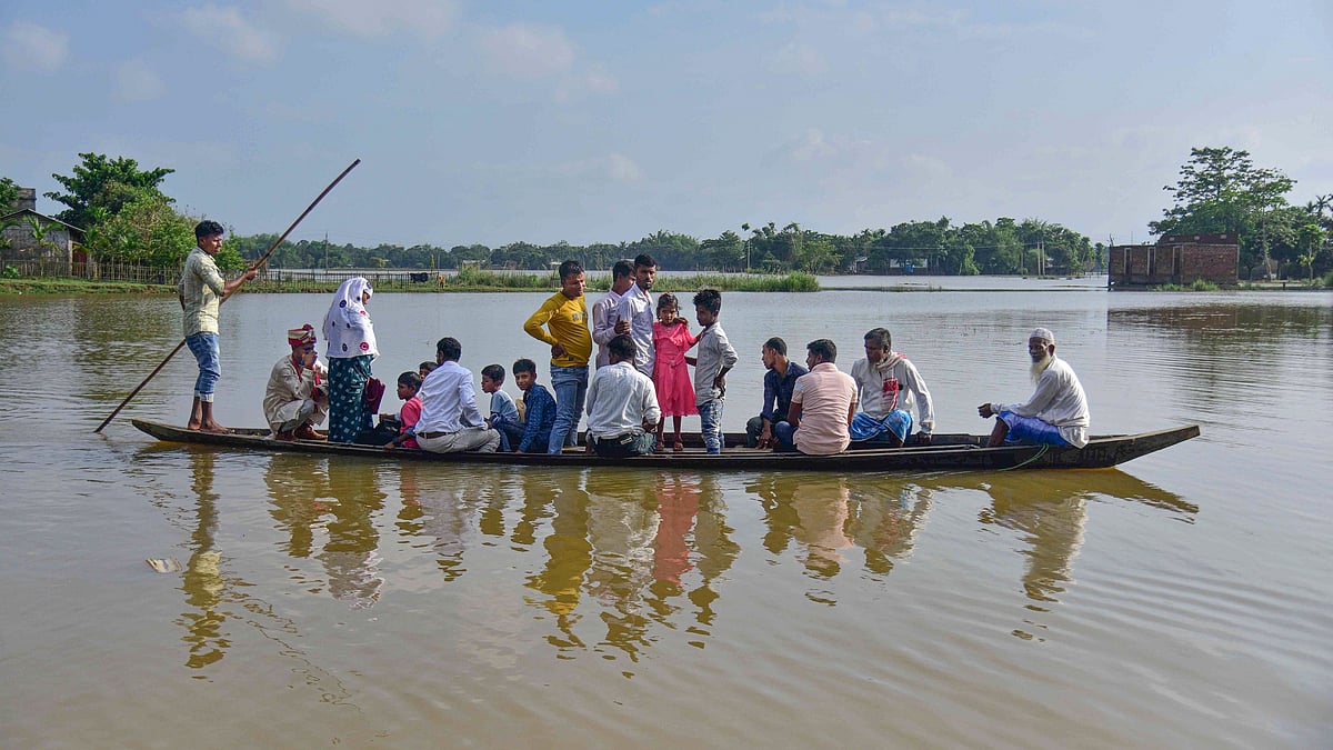 A flooded village in Nagaon district on 20 June (photo: PTI)