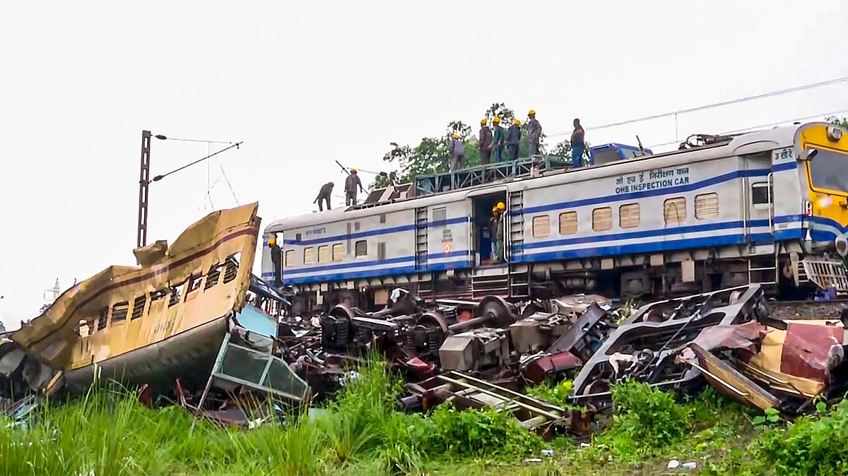 Wreckage of the trains near Rangapani railway station on 18 June (photo: PTI)