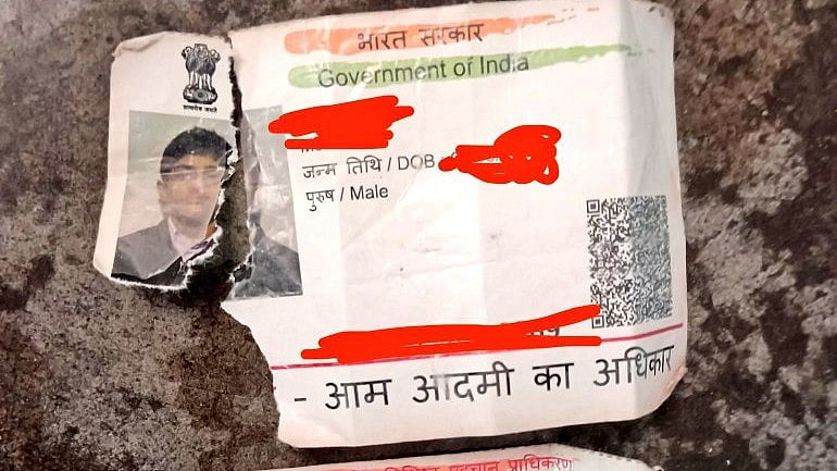 Social media claims of police damaging voters' ID cards in Sambhal, UP (photo courtesy @iamharunkhan/X)