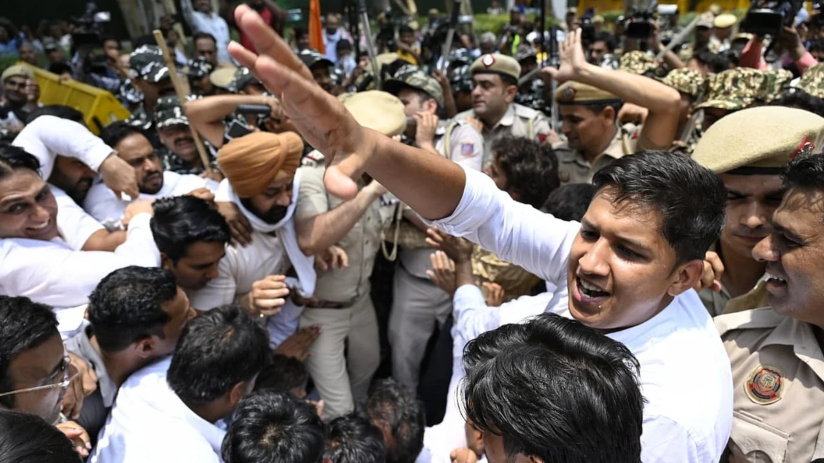 Congress workers protest in New Delhi on 21 June (photo: Vipin/NH)