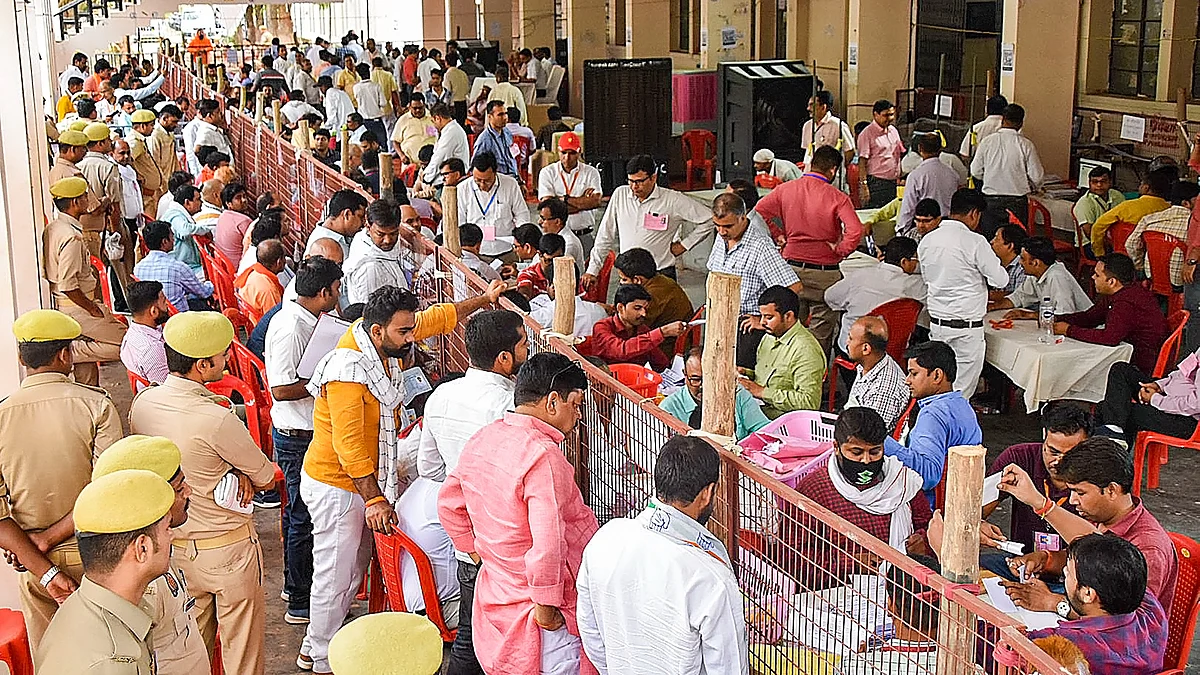 Poll officials busy at a counting centre in Gorakhpur on 4 June (photo: PTI)
