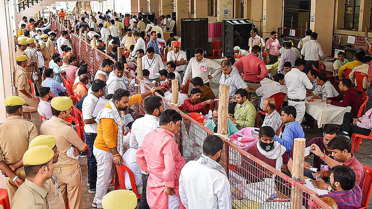 Poll officials busy at a counting centre in Gorakhpur on 4 June (photo: PTI)