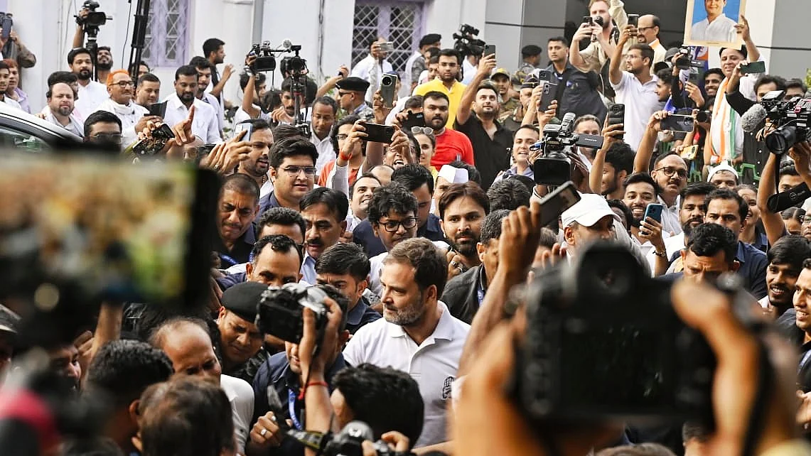Rahul Gandhi besieged by media at Congress HQ in Delhi (photo: Vipin/NH)