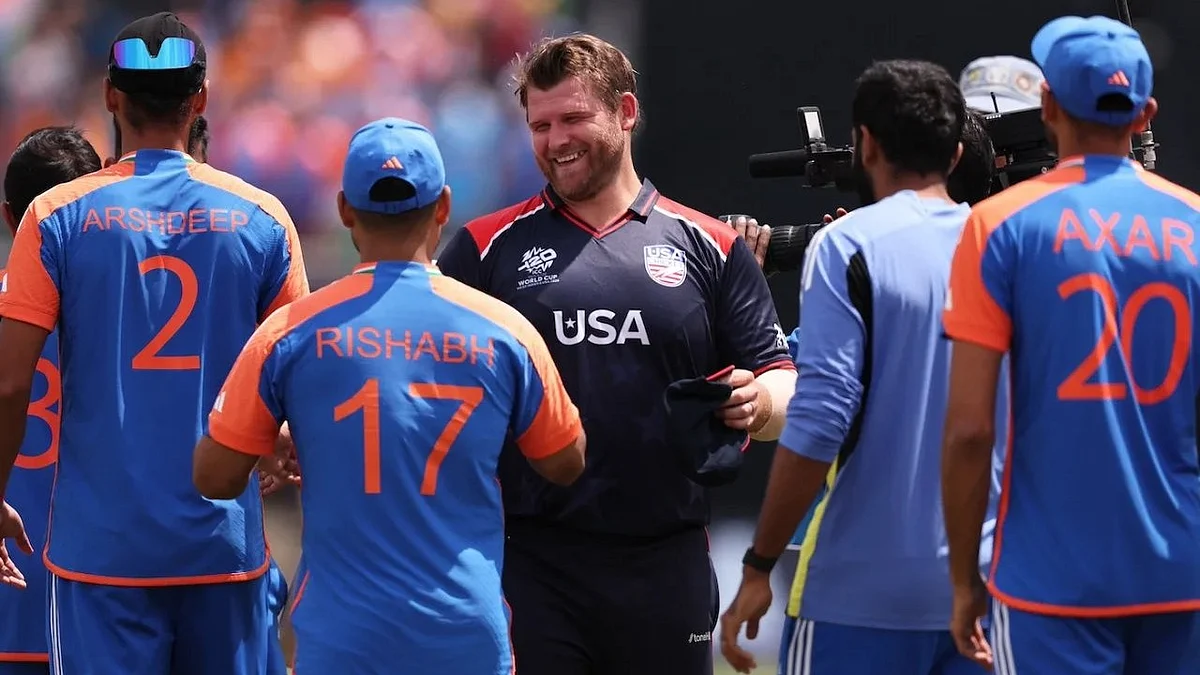 Corey Anderson greets Indian players on 12 June (photo: Getty Images)