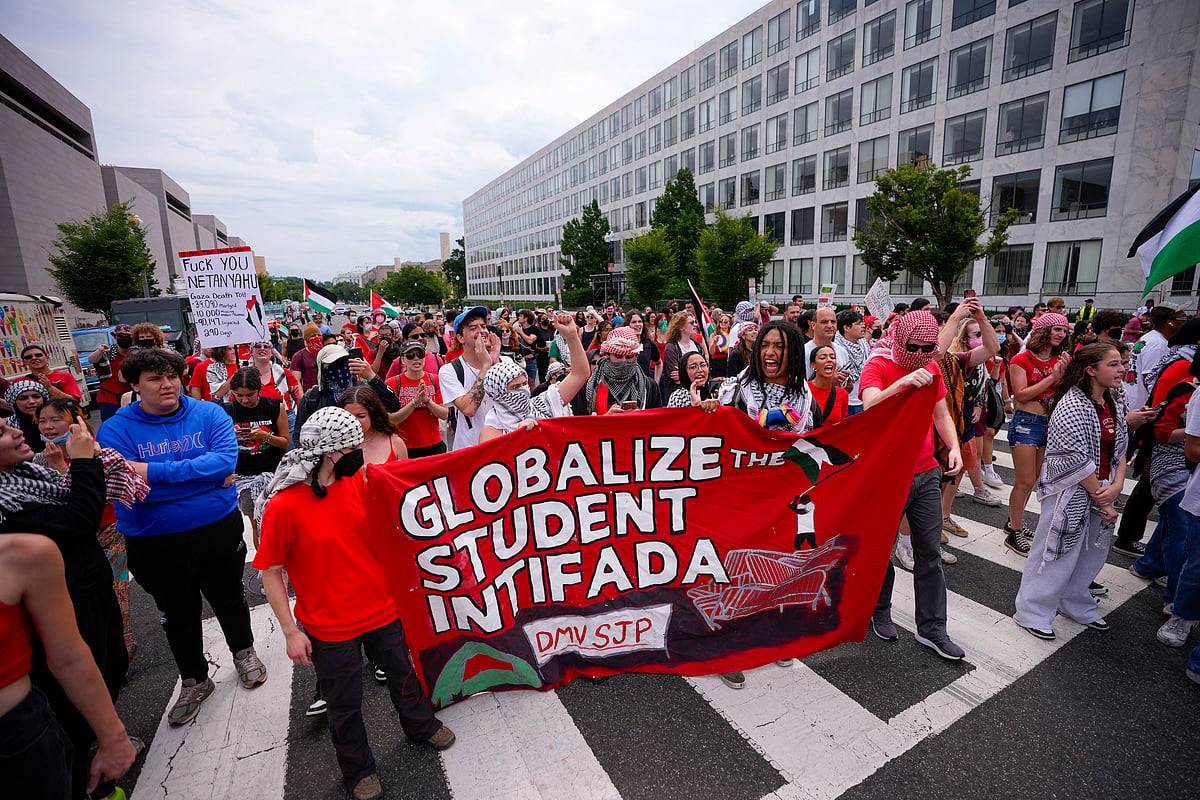 Demonstrators marching on Independence Ave., near the National Mall ahead of a scheduled visit by Benjamin Netanyahu to the US Capitol (photo: PTI)