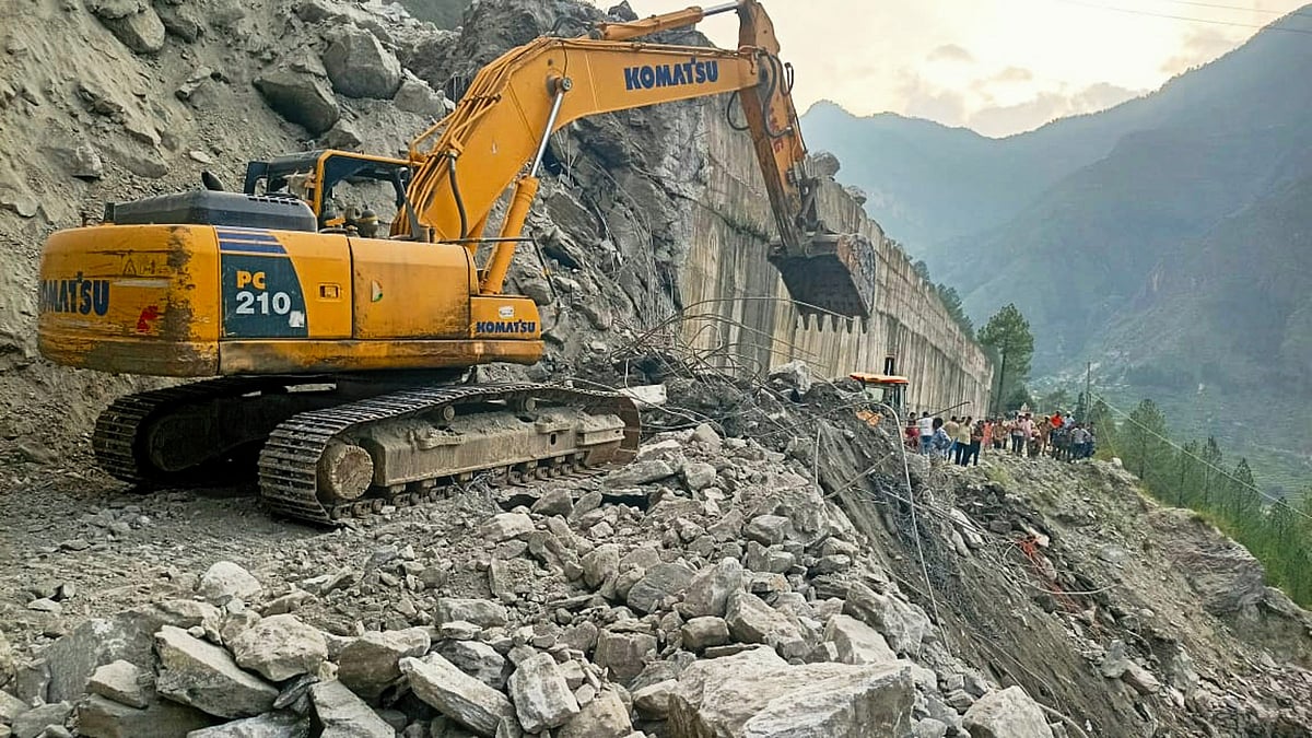 Debris being removed after a landslide on the Badrinath National Highway (photo: PTI)