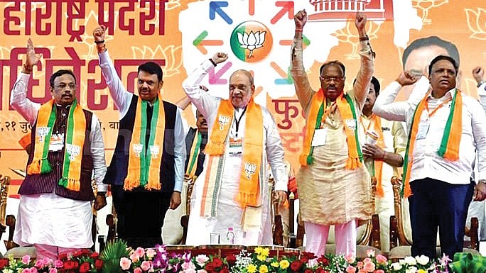 Amit Shah (centre) is clearly under pressure to win Maharashtra for the BJP at any cost