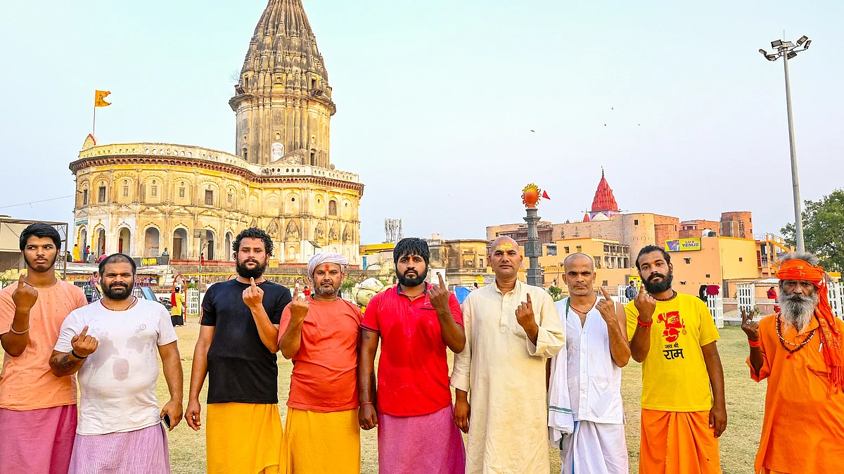 Priests in Ayodhya, UP, after casting their votes on 20 May (photo: PTI)