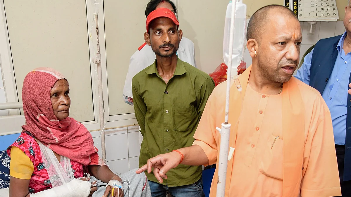 Yogi Adityanath meets victims of the Hathras stampede in hospital (photo: PTI)