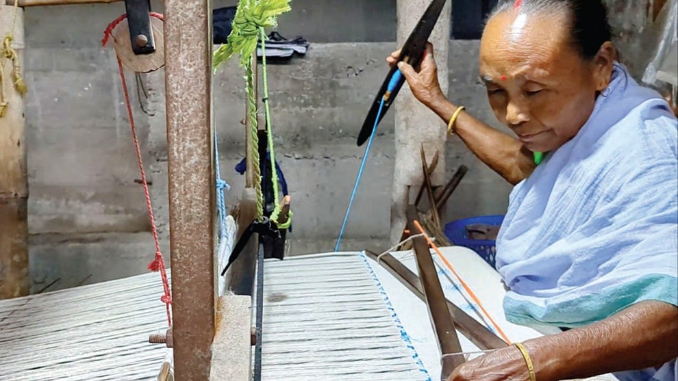 Patney Deuri of Bajrajhar village in Assam at her loom (Photos: Mahibul Hoque)