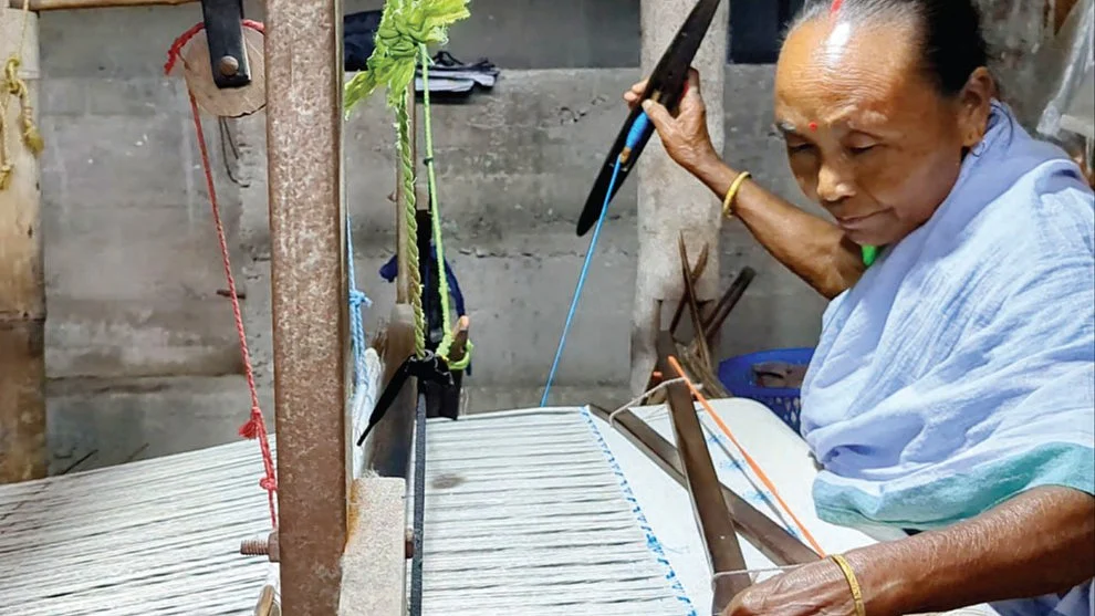 Patney Deuri of Bajrajhar village in Assam at her loom (Photos: Mahibul Hoque)