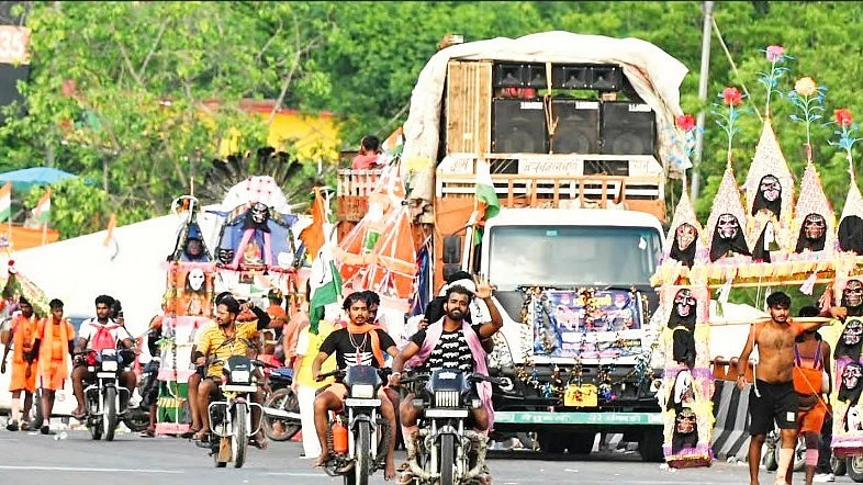Kanwariyas head back from Haridwar with huge truck-mounted column speakers (photo: Getty)