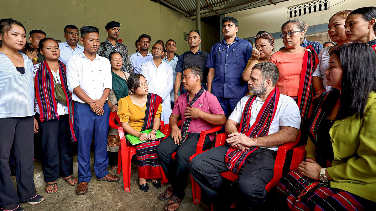 Rahul Gandhi meets flood-hit people in Lakhimpur district (photo: PTI)