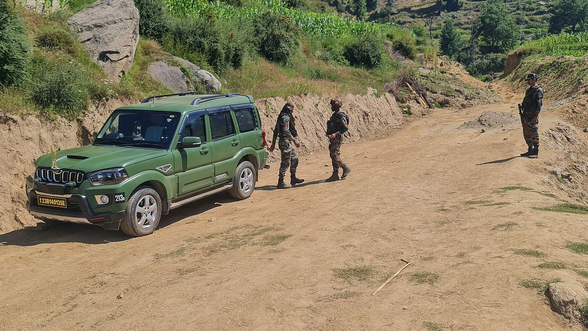 Security personnel during an anti-terror operation in Doda district on 16 July (photo: PTI)