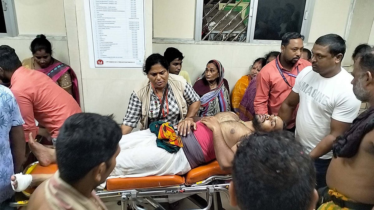 Servitors being taken to the hospital injured after Lord Balabhadra's idol falls (photo: PTI)