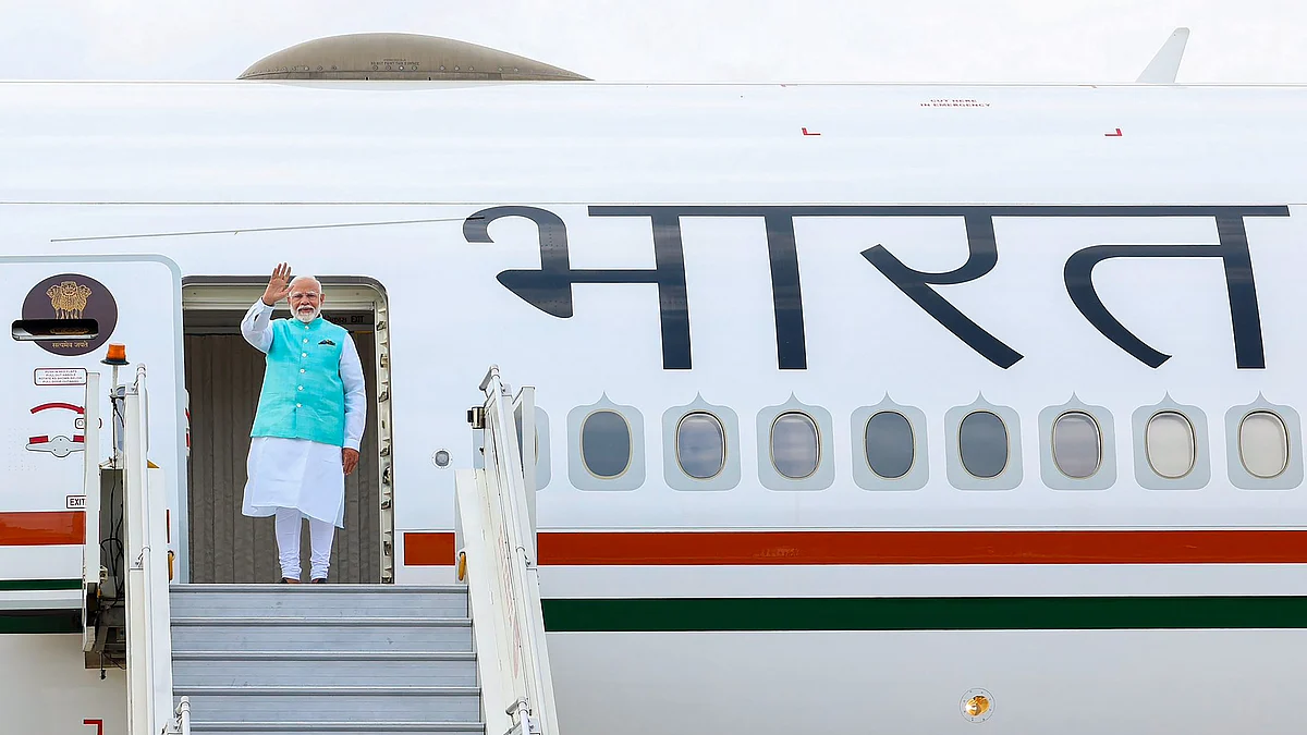 PM Narendra Modi emplanes for Moscow in New Delhi, Monday, 8 July (photo: PTI)