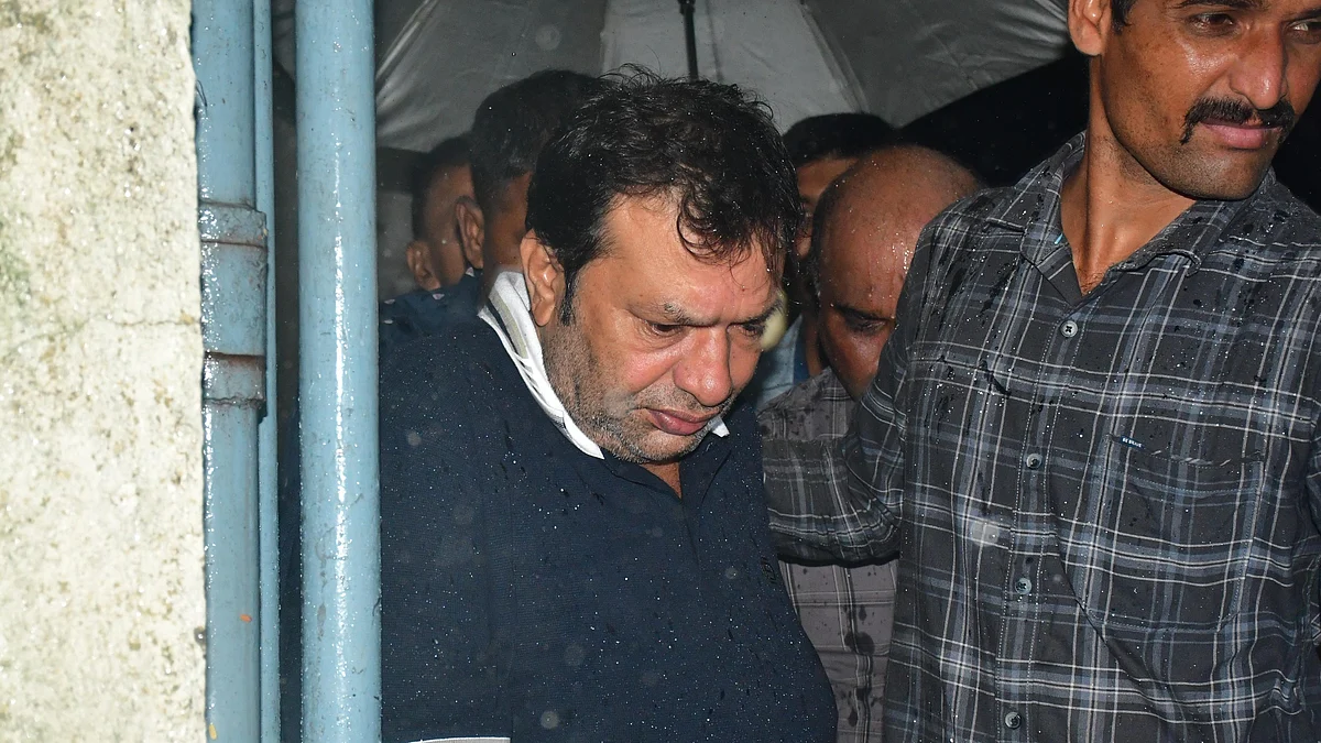 Rajesh Shah leaves after appearing before a court on 8 July (photo: PTI)