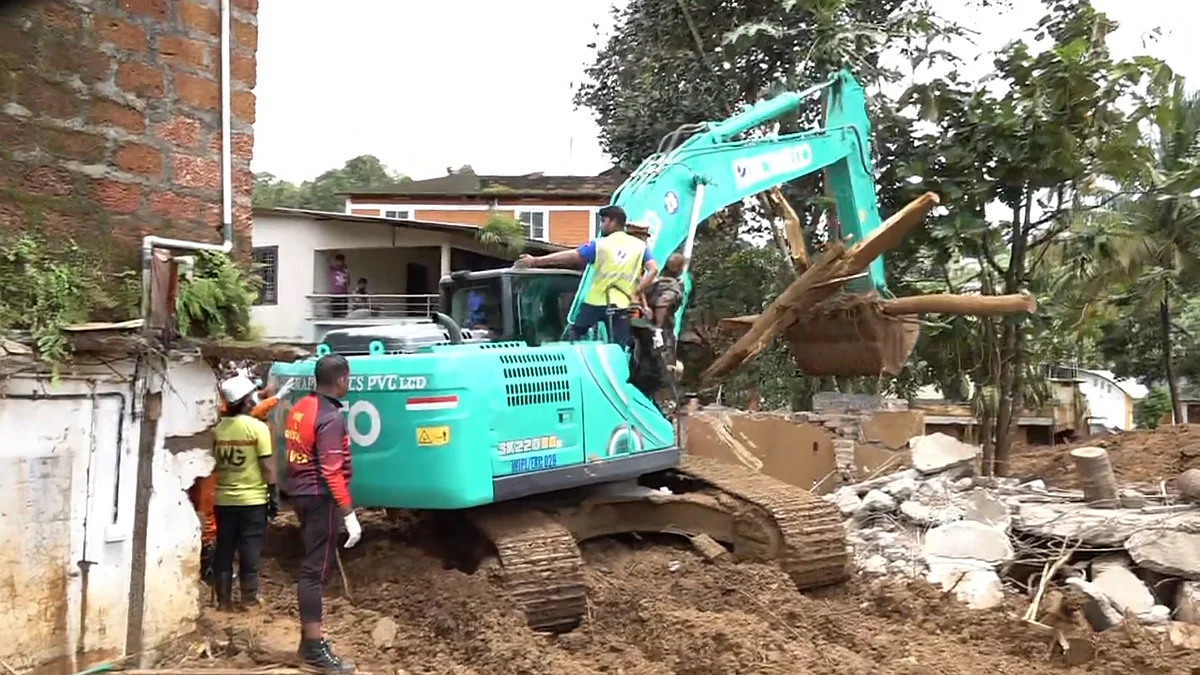 Officials during a rescue operation at landslide-hit Chooralmala area, in Wayanad (photo: PTI)