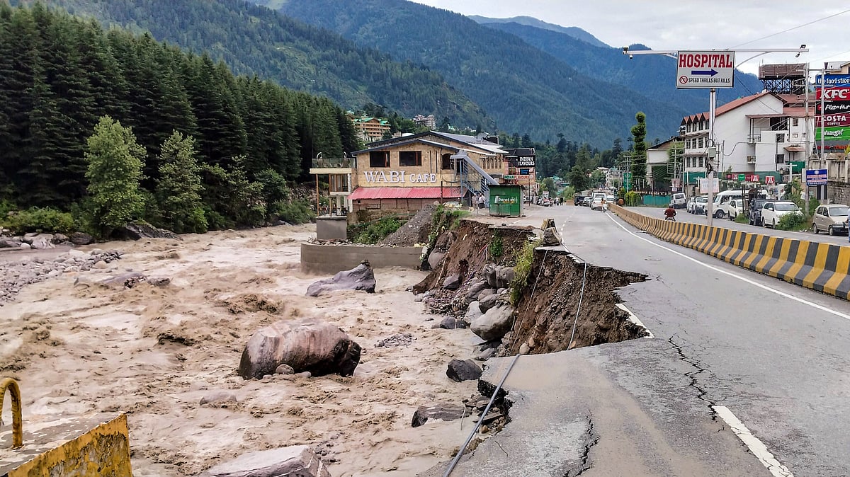 A damaged road following a recent cloudburst in Himachal Pradesh (photo: PTI)
