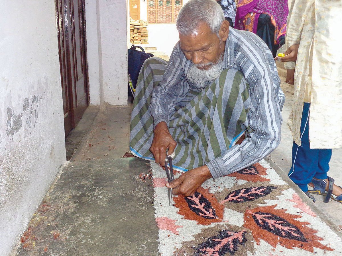 Zahiruddin practises the craft of gultarash, the finetuning of carpet designs