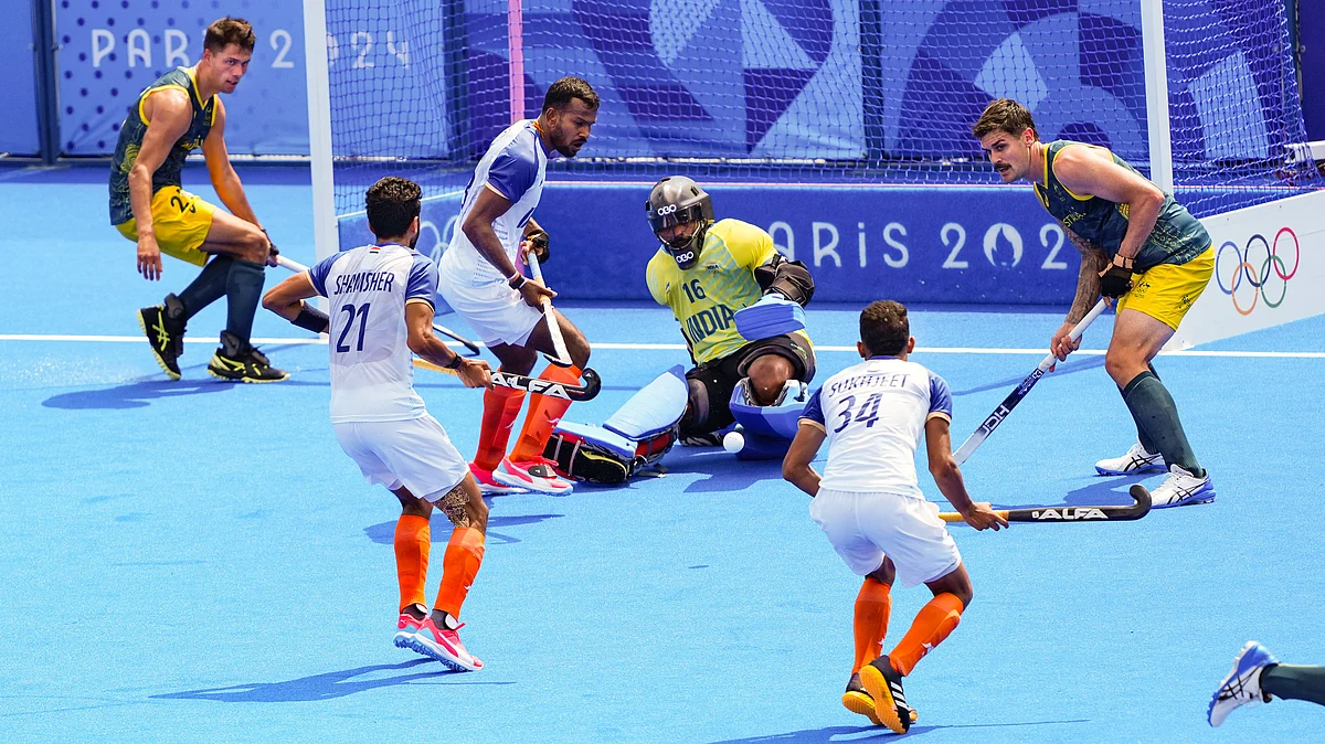 Goalie P.R. Sreejesh (in yellow) in action (photo: PTI)