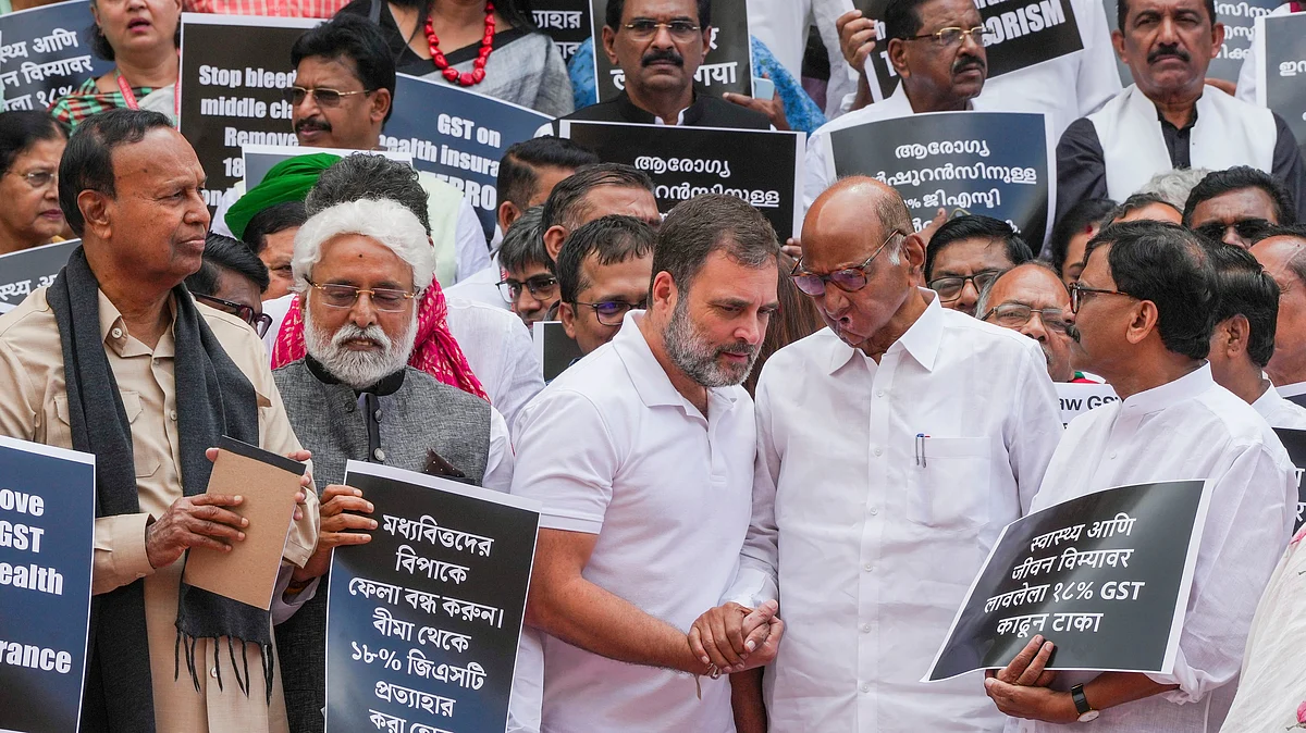 Opposition participate in a protest demanding removal GST from health/medical insurance