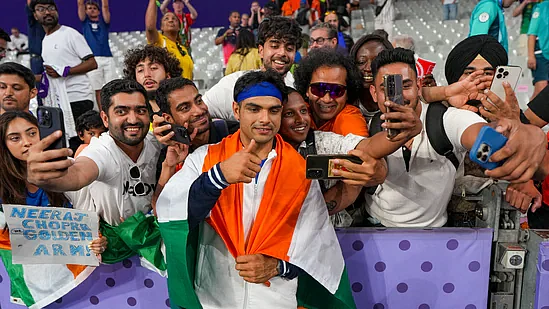 Neeraj Chopra poses with fans in Paris (photo: PTI)