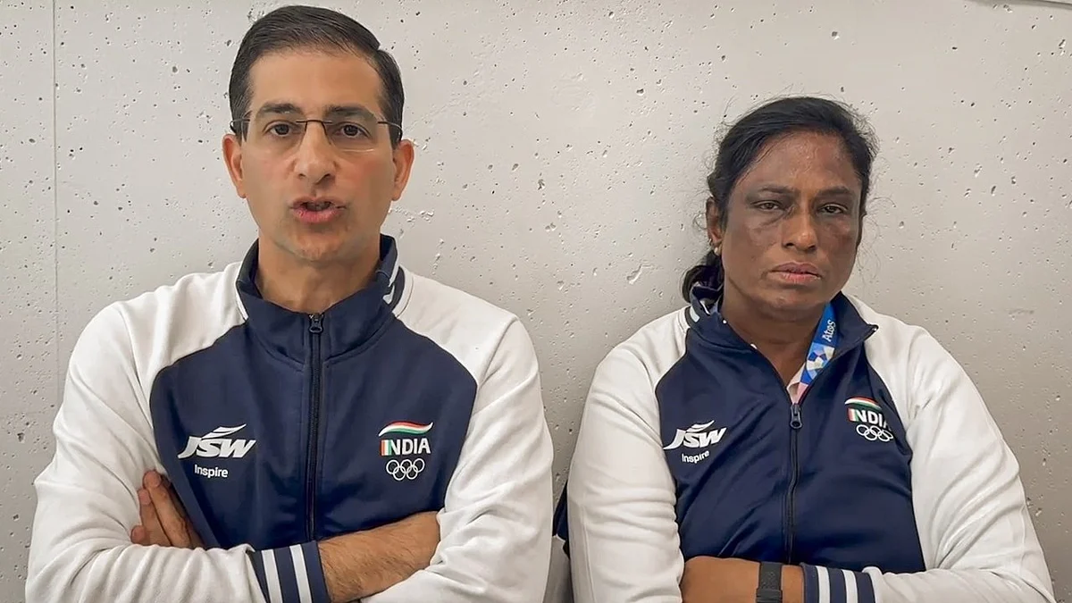 Dinshaw Pardiwala and P.T. Usha making a video statement after the disqualification 
