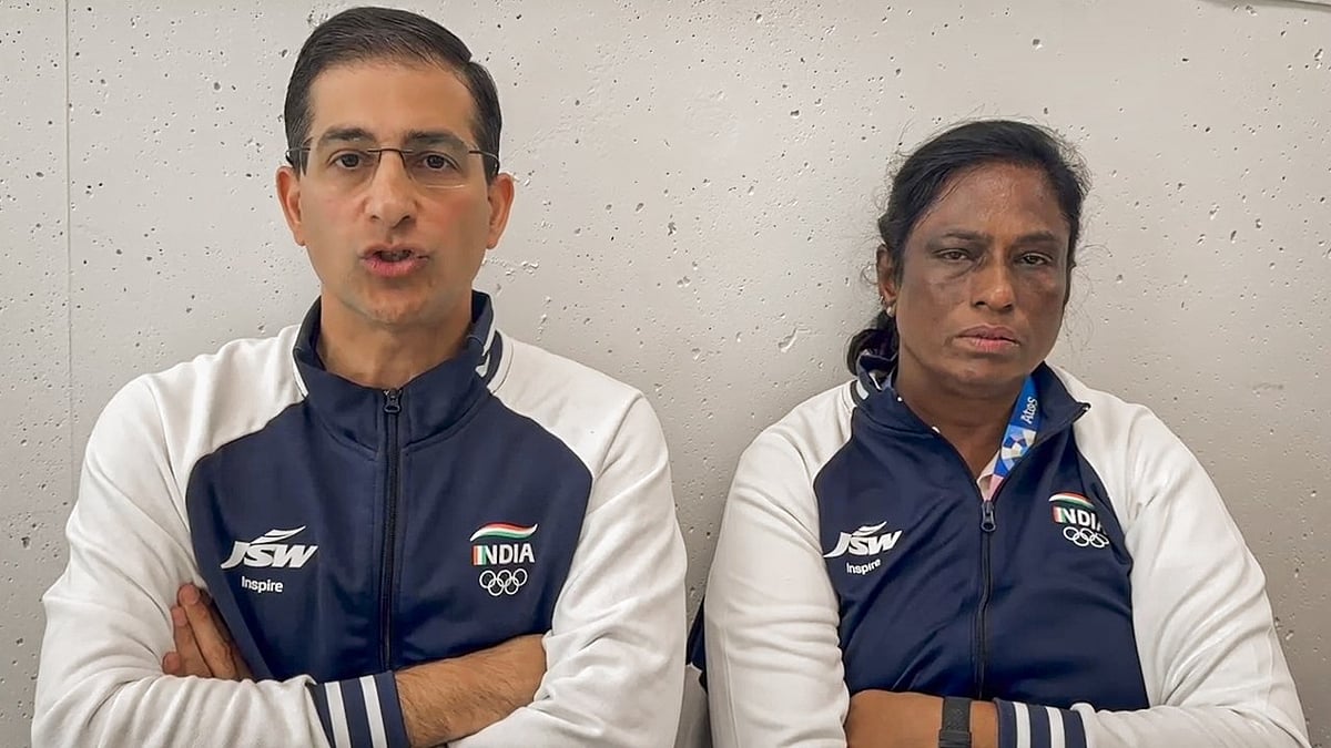 Dinshaw Pardiwala and P.T. Usha making a video statement after the disqualification 
